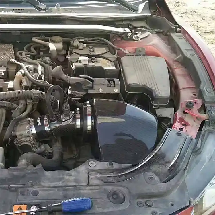 Carbon fiber Atenza air intake installed in Mazda Atenza engine bay