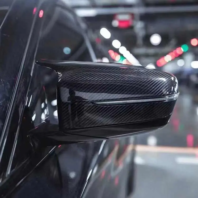 BMW G20 carbon fiber mirror cap installed on black 3 Series