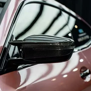 G22 mirror caps installed on BMW G22 Coupe side view